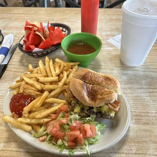 Adult half pound cheeseburger with bacon and crispy fries