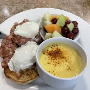 Corned beef hash eggs Benedict with sauce on a side - good, with it would be made in house