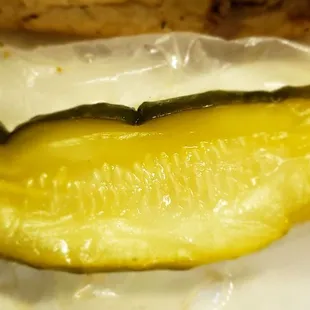 Pickle that came with the beef sandwich.