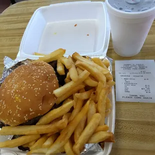 This is the Hungry Man, a steak burger with gyro meat and &apos;the fixins&apos;, plus ample fries and a drink.