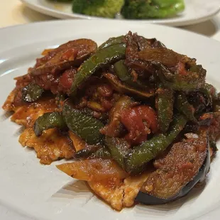 Chicken Calabrese: bold flavors, a bit oily.