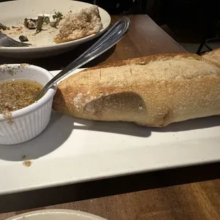 Fresh Italian crusty bread and some amazing sauce.