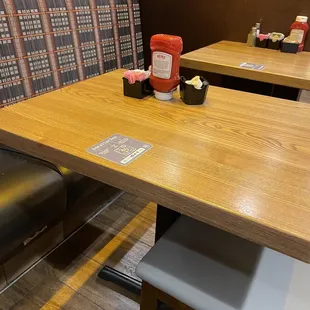 a wooden table and chairs