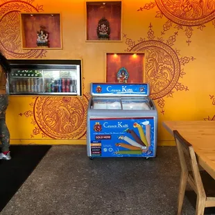 a man standing in front of a counter