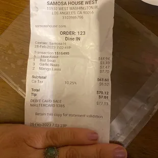 Copy of receipt. Mango Lassi was sour owner refused to refund.