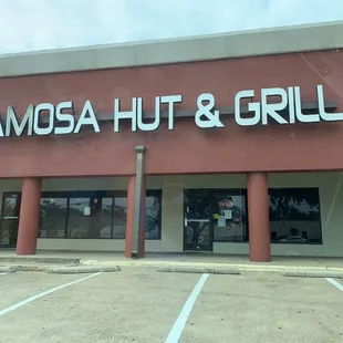 the front of samosa hut and grill
