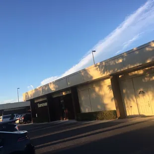 a car parked in front of the store