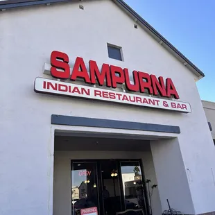 Front entrance with allocated spots for customer parking