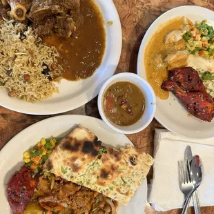 Goat curry, naan bread, tandoori chicken