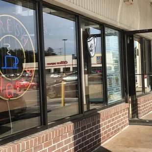 a neon sign in the window