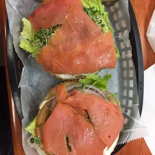 two sandwiches with meat and lettuce