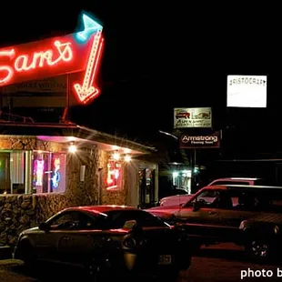 cars parked outside at night