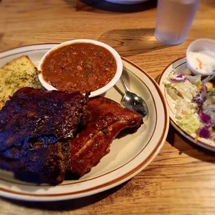 Quarter chicken and ribs combo with sides chili &amp; beans and green salad ($28.95)