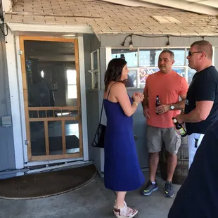 a group of people standing outside