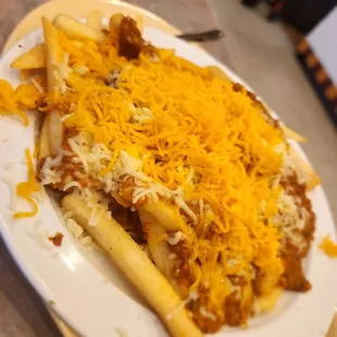 $15 for canned chili, unmelted cheese, cold fries