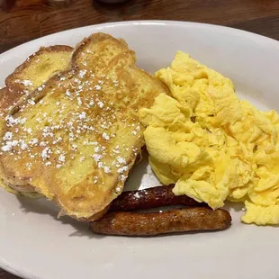 French toast with eggs and sausage.