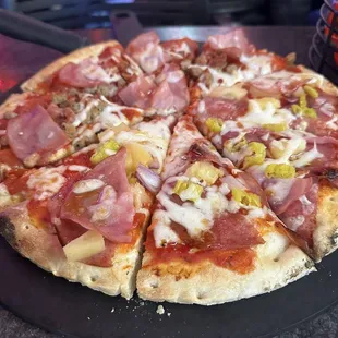 Half and half, meat lovers and Maui Wowi.