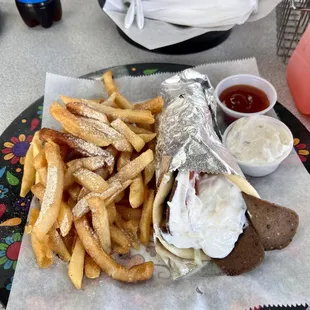 Gyro Lamb Sandwich - Everything was delicious! Crispy fries, great gyro and reasonably priced too. Would absolutely go again..