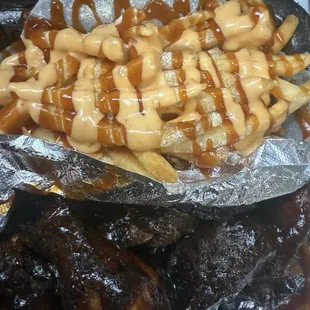 Smokey 15 Pc Jumbo Wings with cheese fries   Lamb Chops 5 Pc