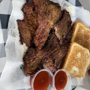 Smoked Brisket with toast and Chicago style sauce