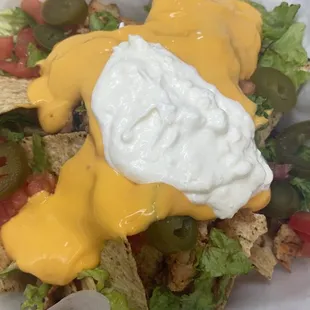 a salad in a styrofoam container
