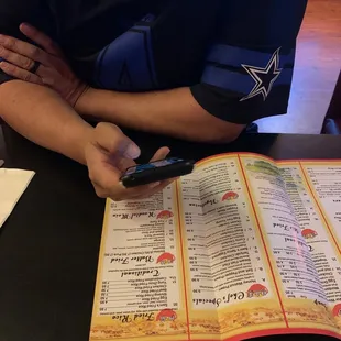 handsome guy deciding what to order