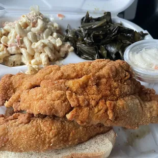 Trout dinner with collards and shrimp macaroni salad