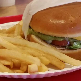 1/3 pound cheese burger with guacamole added and classic fries