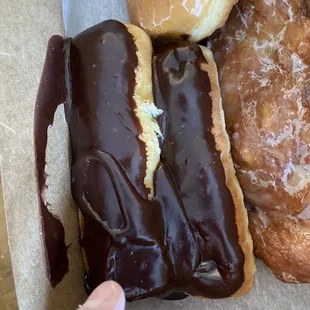 They just poured a bunch of frosting to cover the area that looked like a bite mark.