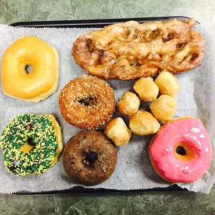 Glazed. Apple fritters. Chocolate sprinkle. Battle milk. Blueberry cake. Strawberry.
