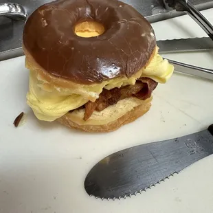 Bacon egg and cheese on chocolate donuts