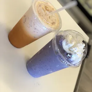 two cold drinks on a table