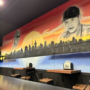 a mural of a baseball player