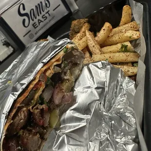 Steak Shawarma Wrap and sumac Fries with a few falafel
