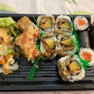 I ate a few pieces. Lunch shrimp tempura, eel avocado, and salmon.