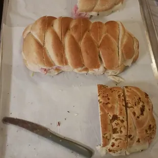 Remainder of a 3 ft party sub that got attacked.  Leftovers! And the fight for leftovers begins....