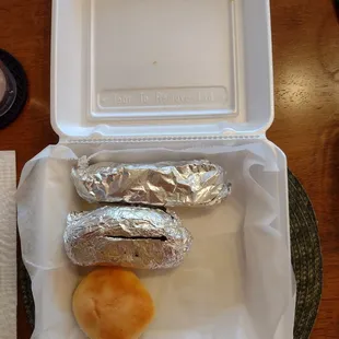 Carry-out salmon which was small, overcooked baked potato and dry/flavorless biscuit.
