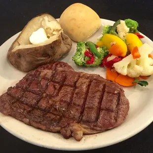 steak, potatoes, and vegetables