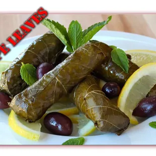 a plate of stuffed grape leaves