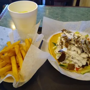Gyro combo meal: $9.21 with drink and tax. Includes a beef or chicken gyro (beef pictueed) with fries or rice pilaf and a drink.