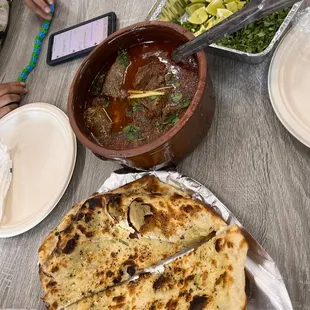 Garlic Naan, Nihari, &amp; toppings for Nihari(lime, ginger, green chili, onion, &amp; cilantro)