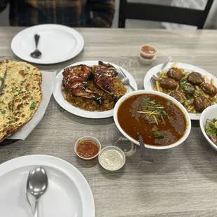Naan, tikka chicken, nihari, and falafel