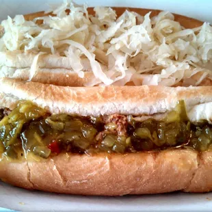 Bottom is all beef dog with spicy sauce, mustard and relish.  Top is all beef dog with mustard and kraut.