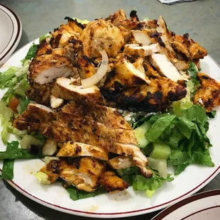 Lebanese salad with a generous portion of delicious grilled chicken.