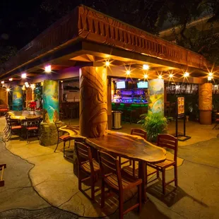 Solid monkeypod wood seating around the Hawaiian sea god Kanaloa.