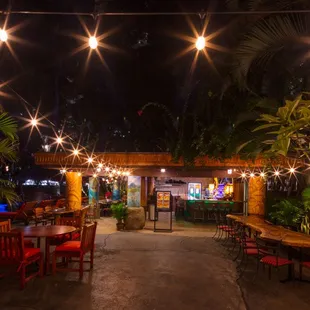 Beautiful wood tables and glittering lights under the starry skies!