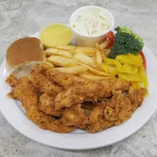 a plate of fried chicken and fries