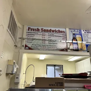 a sign for fresh sandwiches