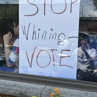 stop whiniing vote sign