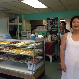 Workers and owner hanging out between customers